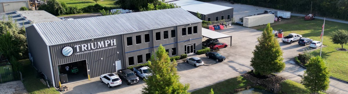 Aerial view of the Triumph Cabling Systems headquarters in Houston: the office, the shop bay and the yard